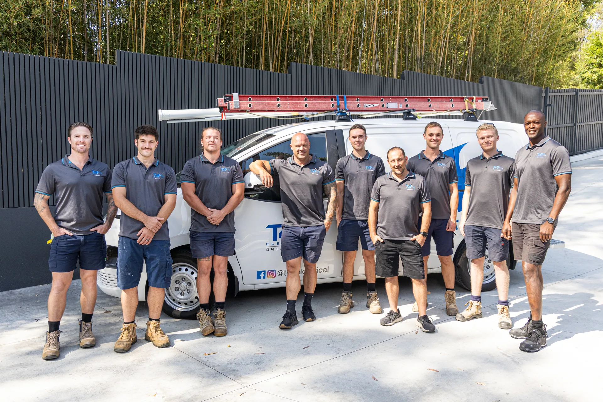 The Family Electrician Broadbeach Waters team with a service van